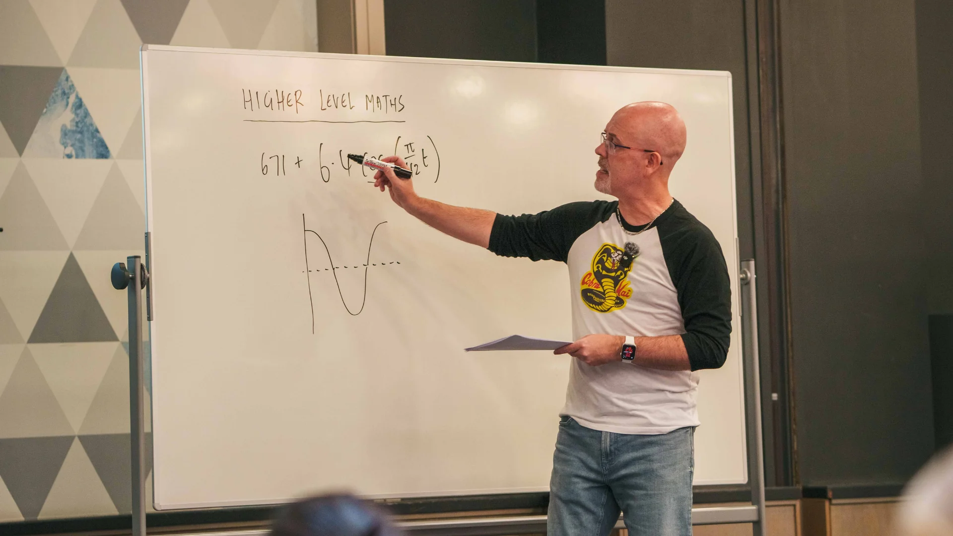 Rob Browne teaching an in-person Leaving Cert maths grind in the Talbot hotel